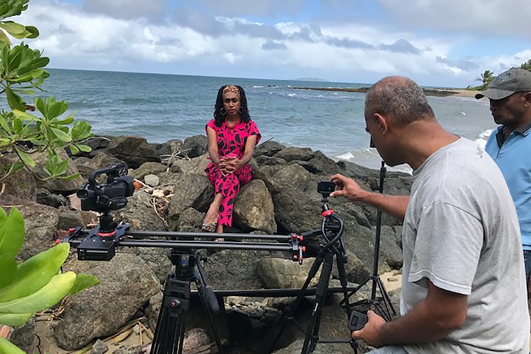 "Filmmaker Larry Thomas filming with Rani, a trans woman from Fiji"